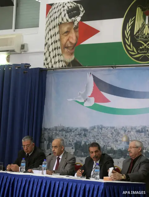 From right to left: Palestinian health minister Hani Abdin, , Abdullah al-Bashir, head of the Arafat Foundation's medical committee, Tawfiq Tirawi, the head of the Palestinian inquiry team into the death of the late Pale...