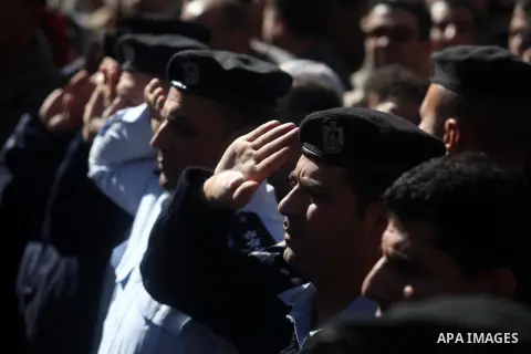 Palestinian policemen stand ready during a rally in the West Bank city of Ramallah on November 29, 2012 to support Palestinian leader Mahmud Abbas who is heading to the United Nations General Assembly today with huge bac...