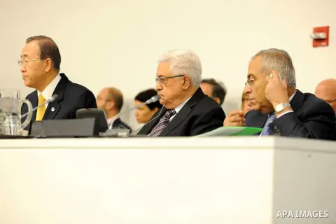 Palestinian President Mahmoud Abbas and United Nations Secretary General Ban Ki-moon, listen during the Special Meeting of the Committee on the Exercise of the Inalienable Rights of the Palestinian People, in observance...