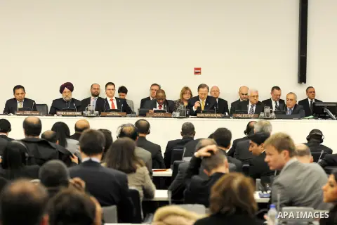 Palestinian President Mahmoud Abbas and United Nations Secretary General Ban Ki-moon, listen during the Special Meeting of the Committee on the Exercise of the Inalienable Rights of the Palestinian People, in observance...
