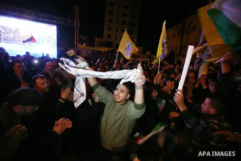 Palestinians celebrate in the West Bank city of Hebron on November 29, 2012 after the General Assembly voted to recognise Palestine as a non-member state. The UN General Assembly on Thursday voted overwhelmingly to recog...
