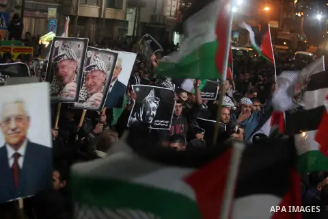 Palestinians celebrate in the West Bank city of Hebron on November 29, 2012 after the General Assembly voted to recognise Palestine as a non-member state. The UN General Assembly on Thursday voted overwhelmingly to recog...