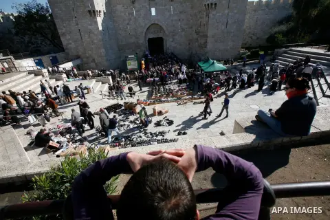 Palestinians walk at the al-Aqsa mosque compound following the Friday prayer in Jerusalem's old city on November 30, 2012. Photo by Mahfouz Abu Turk