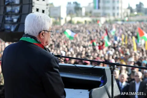 Palestinian President Mahmoud Abbas speaks as Palestinians celebrate their successful bid for UN non-member observer state status, in the West Bank city of Ramallah on December 2, 2012, Abbas arrived to the West Bank aft...