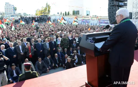 Palestinian President Mahmoud Abbas speaks as Palestinians celebrate their successful bid for UN non-member observer state status, in the West Bank city of Ramallah on December 2, 2012, Abbas arrived to the West Bank aft...