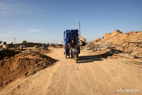 Palestinian labourers repair a bombed smuggling tunnel linking the Gaza Strip to Egypt, in Rafah, on December 2, 2012. Israeli airforce jets bombed most of the smuggling tunnels in the southern Gaza Strip during its war...