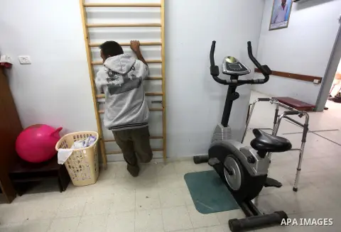 Abd El-Fatah Hassouna, Palestinian man who lost his leg, during rehabilitation sport in Gaza city, on Dec. 03, 2012. International Day of People with Disability, is an international observance promoted by the United Nati...