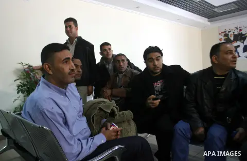 Palestinian members of Fatah movement arrive to Rafah crossing border between Gaza strip and Egypt on December 03, 2012. Hamas movement allowed to Fatah members to enter Gaza Strip after they left since the Islamist grou...