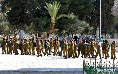 Israeli soldiers walk at the al-Aqsa mosque compound, Islam's third holiest site, in the old city of Jerusalem on December 03, 2012. Photo by Mahfouz Abu Turk