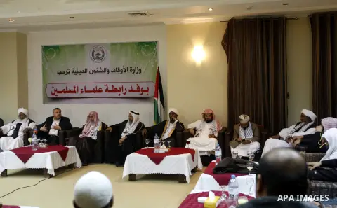 Palestinian Minister of Religious Affairs in Gaza strip Ismail Radwan meets with the members of delegation of Association of Muslim Scholars in Gaza city, Dec 04, 2012. The delegation is expected to meet with war victims...
