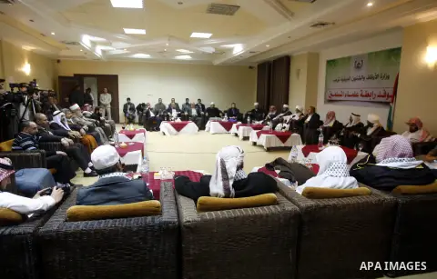 Palestinian Minister of Religious Affairs in Gaza strip Ismail Radwan meets with the members of delegation of Association of Muslim Scholars in Gaza city, Dec 04, 2012. The delegation is expected to meet with war victims...
