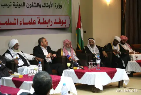 Palestinian Minister of Religious Affairs in Gaza strip Ismail Radwan meets with the members of delegation of Association of Muslim Scholars in Gaza city, Dec 04, 2012. The delegation is expected to meet with war victims...
