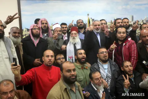 Palestinian Prime Minister in Gaza Strip, Ismail Haniyeh meets with delegation headed by Shaykh al-Mujahideen Sheikh Hafez Salama, in Gaza city on Dec. 05, 2012. Photo by Ashraf Amra