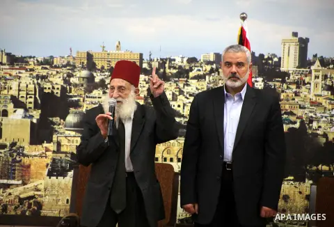 Palestinian Prime Minister in Gaza Strip, Ismail Haniyeh meets with Shaykh al-Mujahideen Sheikh Hafez Salama, in Gaza city on Dec. 05, 2012. Photo by Ashraf Amra