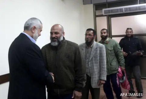 Palestinian Prime Minister in Gaza Strip, Ismail Haniyeh meets with delegation headed by Shaykh al-Mujahideen Sheikh Hafez Salama, in Gaza city on Dec. 05, 2012. Photo by Ashraf Amra