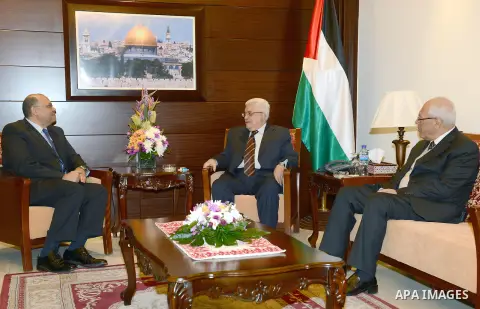 Palestinian President Mahmoud Abbas meets with the Egyptian ambassador in the West Bank city of Ramallah, 05 December 2012. Photo by Thaer Ganaim