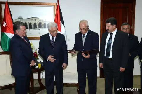 Palestinian President Mahmoud Abbas meets with Jordan's King Abdullah II during their meeting in the West Bank city of Ramallah on December 6, 2012. The Jordanian King arrived in Ramallah for the first visit by a top for...