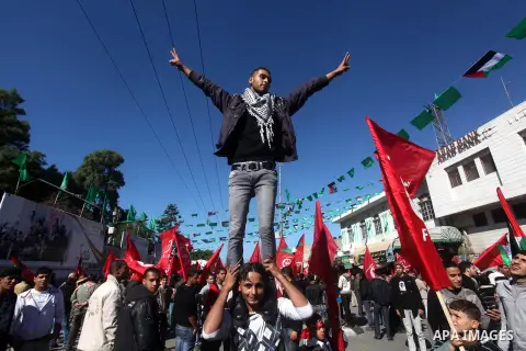 Palestinians take part in a rally organized by the Popular Front for the Liberation of Palestine (PFLP) to celebrate the 45th anniversary of its founding in Gaza City December 6, 2012. Photo by Ashraf Amra