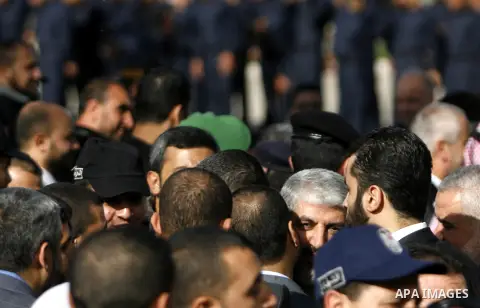 Hamas chief Khaled Meshaal hugs Palestinian leaders upon his arrival in Rafah, southern Gaza, on December 7, 2012. Meshaal is making his first-ever visit to the Gaza Strip amid tight security for festivities marking the...