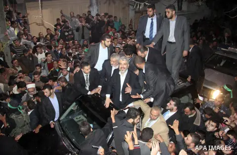 Hamas leader Khaled Meshaal visits the home of the al-Dallu family, which destroyed by an Israeli airstrike on November 24 and several members of the al-Dallu family - five of them children - and two of their neighbours...
