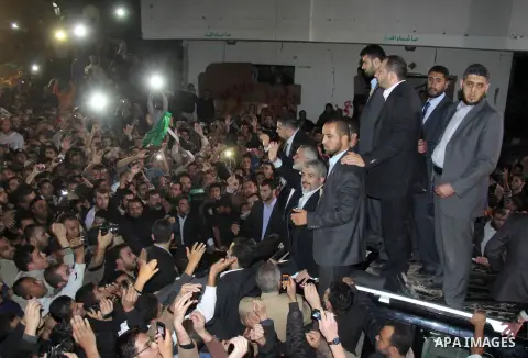 Hamas leader Khaled Meshaal visits the home of the al-Dallu family, which destroyed by an Israeli airstrike on November 24 and several members of the al-Dallu family - five of them children - and two of their neighbours...
