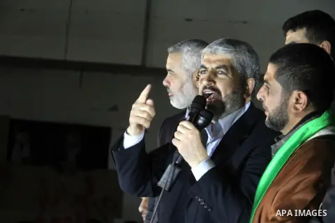 Hamas leader Khaled Meshaal visits the home of the al-Dallu family, which destroyed by an Israeli airstrike on November 24 and several members of the al-Dallu family - five of them children - and two of their neighbours...