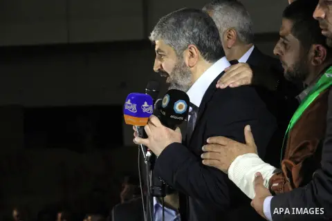 Hamas leader Khaled Meshaal visits the home of the al-Dallu family, which destroyed by an Israeli airstrike on November 24 and several members of the al-Dallu family - five of them children - and two of their neighbours...