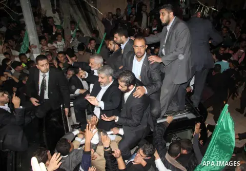 Hamas leader Khaled Meshaal visits the home of the al-Dallu family, which destroyed by an Israeli airstrike on November 24 and several members of the al-Dallu family - five of them children - and two of their neighbours...