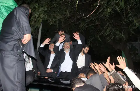 Hamas leader Khaled Meshaal visits the home of the al-Dallu family, which destroyed by an Israeli airstrike on November 24 and several members of the al-Dallu family - five of them children - and two of their neighbours...