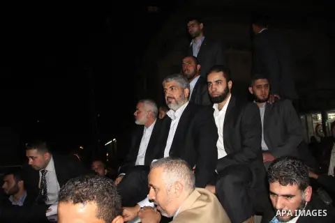 Hamas leader Khaled Meshaal visits the home of the al-Dallu family, which destroyed by an Israeli airstrike on November 24 and several members of the al-Dallu family - five of them children - and two of their neighbours...