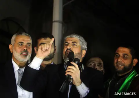 Hamas leader Khaled Meshaal visits the home of the al-Dallu family, which destroyed by an Israeli airstrike on November 24 and several members of the al-Dallu family - five of them children - and two of their neighbours...