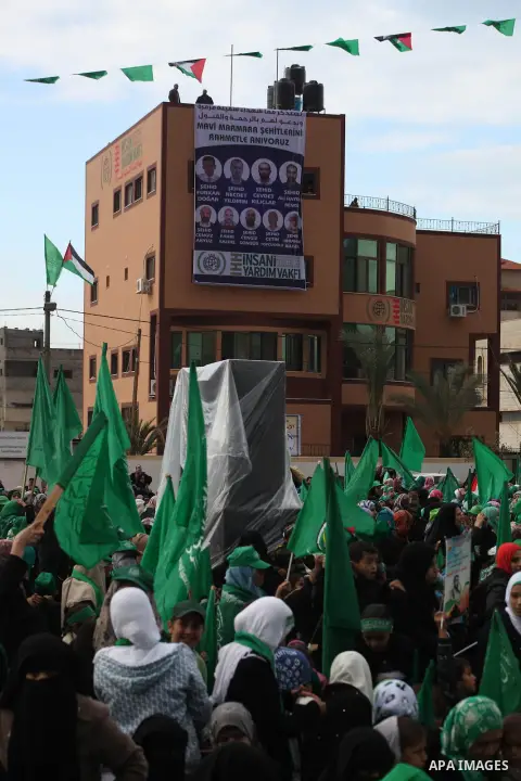 Palestinian Hamas supporters gather to attend a Hamas rally marking the 25th anniversary of the Islamist movement's founding in Gaza City on December 8, 2012. Hamas chief Khaled Meshaal arrived to Gaza strip on December...