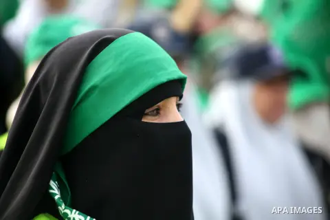 Palestinian Hamas supporters gather to attend a Hamas rally marking the 25th anniversary of the Islamist movement's founding in Gaza City on December 8, 2012. Hamas chief Khaled Meshaal arrived to Gaza strip on December...