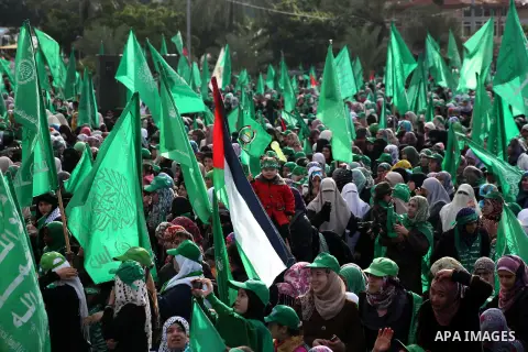 Palestinian Hamas supporters gather to attend a Hamas rally marking the 25th anniversary of the Islamist movement's founding in Gaza City on December 8, 2012. Hamas chief Khaled Meshaal arrived to Gaza strip on December...