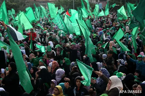 Palestinian Hamas supporters gather to attend a Hamas rally marking the 25th anniversary of the Islamist movement's founding in Gaza City on December 8, 2012. Hamas chief Khaled Meshaal arrived to Gaza strip on December...