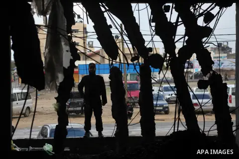 Soldiers of Al-Qassam brigades, militant wing of Hamas, attend a Hamas rally marking the 25th anniversary of the Islamist movement's founding in Gaza City on December 8, 2012. Hamas chief Khaled Meshaal arrived to Gaza s...