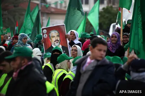 Palestinian Hamas supporters gather to attend a Hamas rally marking the 25th anniversary of the Islamist movement's founding in Gaza City on December 8, 2012. Hamas chief Khaled Meshaal arrived to Gaza strip on December...