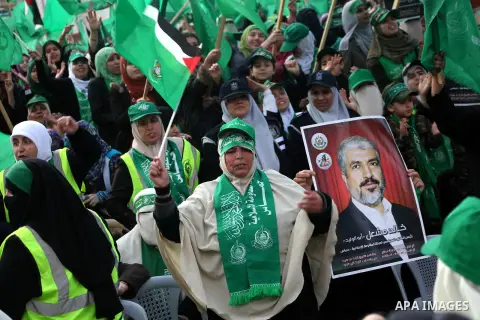 Palestinian Hamas supporters gather to attend a Hamas rally marking the 25th anniversary of the Islamist movement's founding in Gaza City on December 8, 2012. Hamas chief Khaled Meshaal arrived to Gaza strip on December...