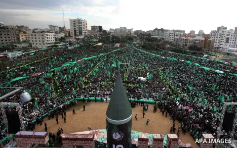 Palestinian Hamas supporters gather to attend a Hamas rally marking the 25th anniversary of the Islamist movement's founding in Gaza City on December 8, 2012. Hamas chief Khaled Meshaal arrived to Gaza strip on December...