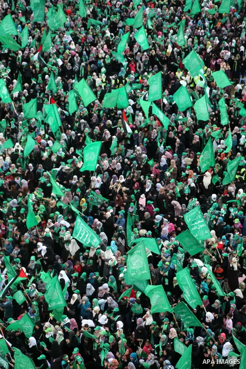 Palestinian Hamas supporters gather to attend a Hamas rally marking the 25th anniversary of the Islamist movement's founding in Gaza City on December 8, 2012. Hamas chief Khaled Meshaal arrived to Gaza strip on December...