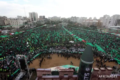 Palestinian Hamas supporters gather to attend a Hamas rally marking the 25th anniversary of the Islamist movement's founding in Gaza City on December 8, 2012. Hamas chief Khaled Meshaal arrived to Gaza strip on December...