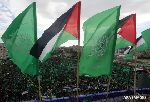 Palestinian Hamas supporters gather to attend a Hamas rally marking the 25th anniversary of the Islamist movement's founding in Gaza City on December 8, 2012. Hamas chief Khaled Meshaal arrived to Gaza strip on December...