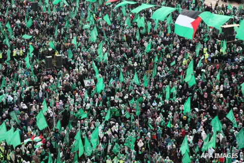 Palestinian Hamas supporters gather to attend a Hamas rally marking the 25th anniversary of the Islamist movement's founding in Gaza City on December 8, 2012. Hamas chief Khaled Meshaal arrived to Gaza strip on December...