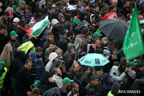 Palestinian Hamas supporters attend a Hamas rally marking the 25th anniversary of the Islamist movement's founding in Gaza City on December 8, 2012. Hamas chief Khaled Meshaal arrived to Gaza strip on December 7 during h...