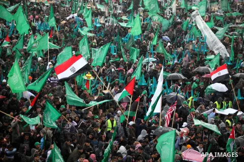 Palestinian Hamas supporters attend a Hamas rally marking the 25th anniversary of the Islamist movement's founding in Gaza City on December 8, 2012. Hamas chief Khaled Meshaal arrived to Gaza strip on December 7 during h...