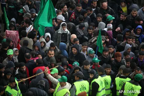 Palestinian Hamas supporters attend a Hamas rally marking the 25th anniversary of the Islamist movement's founding in Gaza City on December 8, 2012. Hamas chief Khaled Meshaal arrived to Gaza strip on December 7 during h...