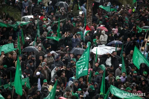 Palestinian Hamas supporters attend a Hamas rally marking the 25th anniversary of the Islamist movement's founding in Gaza City on December 8, 2012. Hamas chief Khaled Meshaal arrived to Gaza strip on December 7 during h...