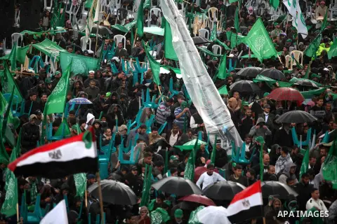 Palestinian Hamas supporters attend a Hamas rally marking the 25th anniversary of the Islamist movement's founding in Gaza City on December 8, 2012. Hamas chief Khaled Meshaal arrived to Gaza strip on December 7 during h...