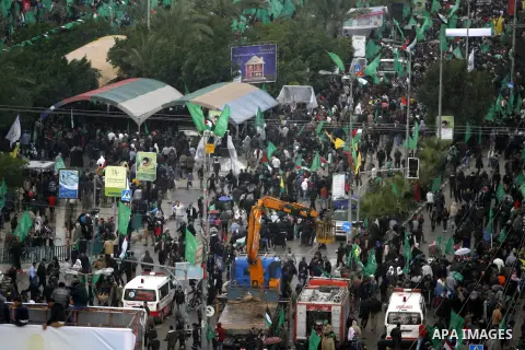 Palestinian Hamas supporters attend a Hamas rally marking the 25th anniversary of the Islamist movement's founding in Gaza City on December 8, 2012. Hamas chief Khaled Meshaal arrived to Gaza strip on December 7 during h...