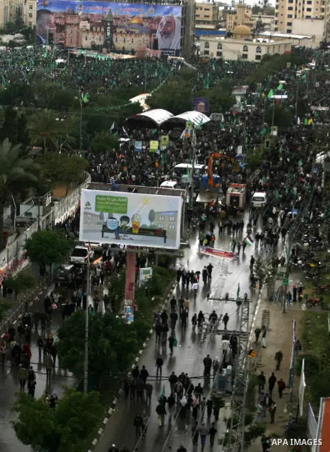 Palestinian Hamas supporters attend a Hamas rally marking the 25th anniversary of the Islamist movement's founding in Gaza City on December 8, 2012. Hamas chief Khaled Meshaal arrived to Gaza strip on December 7 during h...